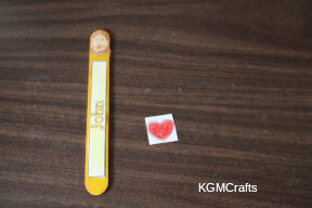 step 3 glue the heart to the back of John