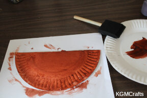 boat step 1 paint half of a paper plate brown