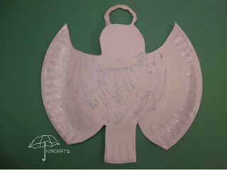 cut an angel from a paper plate Top your Christmas tree with a paper plate angel