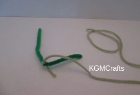 step 2 tie yarn on pipe cleaner