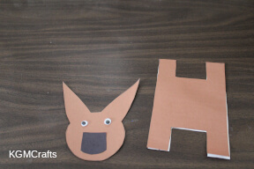 glue the brown paper and cardstock together