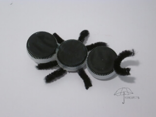bottle cap ant use recycled materials to make an ant