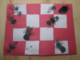 stamped ants on red and white paper stamped ant project