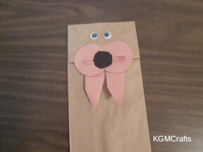 glue the paper pieces on the bag