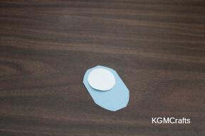 step 8 round the rectangle and glue the circle to the top