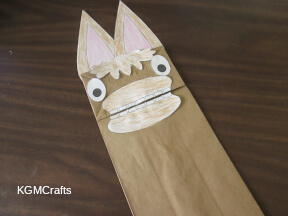 step 5 glue the eyes and bottom mouth piece on