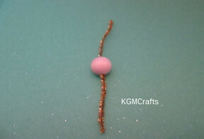 step 1 place a bead on a pipe cleaner