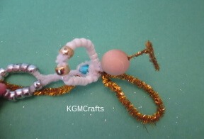 step 7 fold pipe cleaner into wings