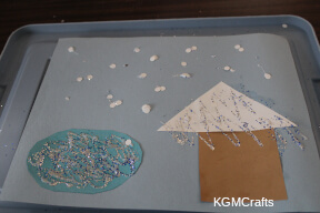 step 4 add glitter and paper snowflakes