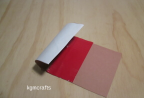 step 3 duck tape the side to the cardboard roll