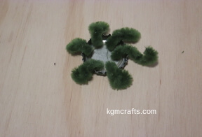 step 4 place pipe cleaner pieces in bottle cap
