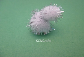 glue two pompoms together