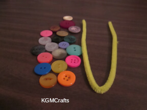 bend the pipe cleaner gather some buttons