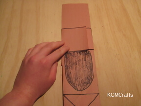 flip the paper over so you see the tomb