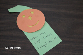 glue the happy face on the other side