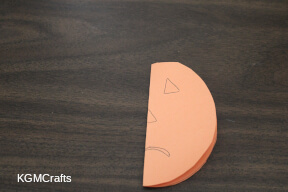 fold the orange circle in half