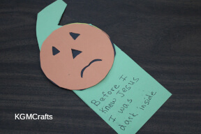 glue the frowning face to on side