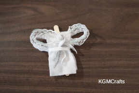 step 4 add the end of the pipe cleaner to the back of the belt