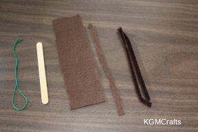 cut felt and pipe cleaner to make the craft stick characters robe materials