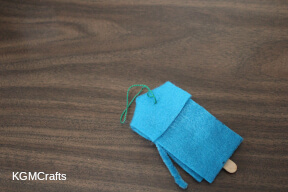 step 5 add the string to the ornament