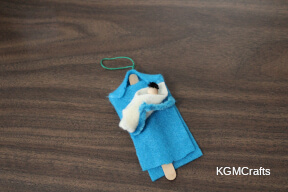 step 6 place baby Jesus in Mary's arms