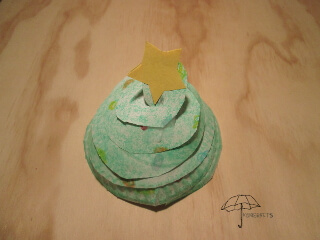 made with a paper plate spiral Christmas tree
