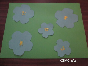 step 3 glue the flowers to the background piece