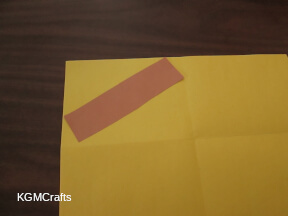 step 2 add a strip of brown paper