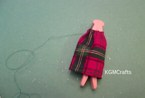 step 3 place fabric on clothespin