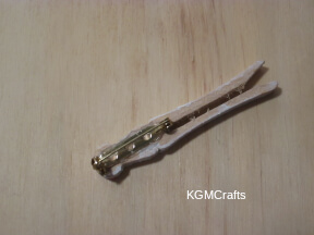 add the pin to the back