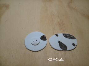 make the nose and add spots to the cow