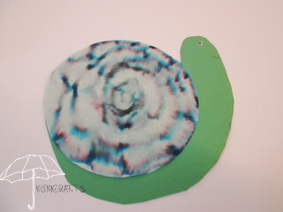 colored filter and green paper snail coffee filter snail