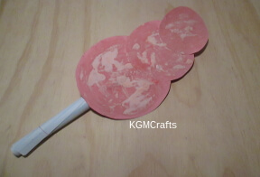 glue the stick to the cotton candy