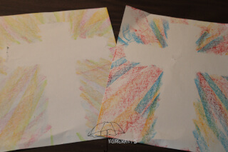 use crayons to color a cross colored cross