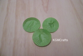 cupcake line shamrock step 1 flatten the cupcake liners