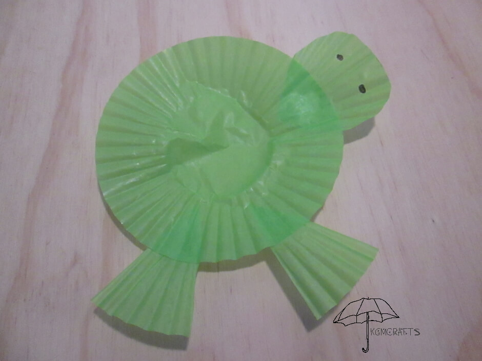 green cupcake liner made into a turtle cupcake liner turtle