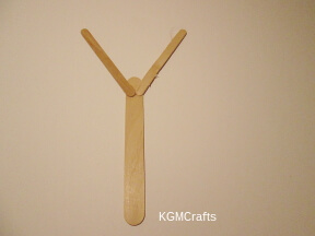 glue the craft sticks together
