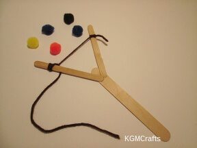 add the pompom rocks