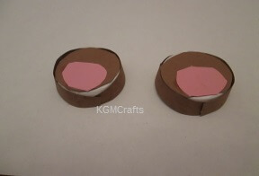 cut pink paper for the ears