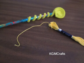 wrap end around the pencil