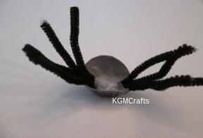 step 4 tape pipe cleaners to egg carton