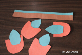 glue the blue paper to the buckets and trench