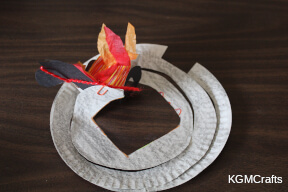 paper clip the horse to the chariot and make some flames