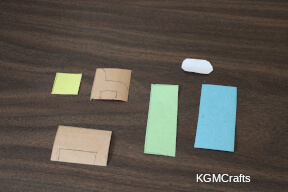 cut the paper for the bed, table, chair, and candle