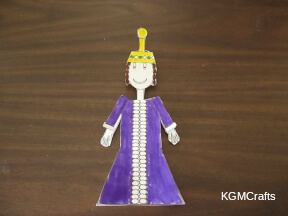 fold the tabs around the paper doll