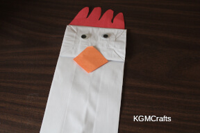 add the comb and top part of the beak