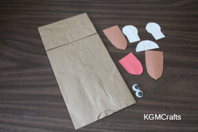 cut out the cow pieces to make a puppet