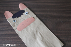 glue the pieces to the bag