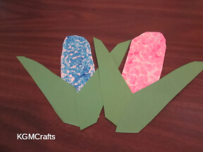 glue the leave to the flowers