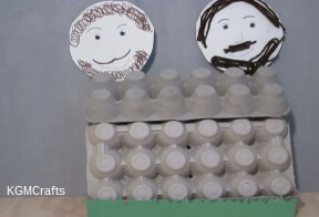 step 8 stick Popsicle stick in hole in egg carton